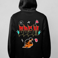 Black hoodie with colorful graphic design on a gray background